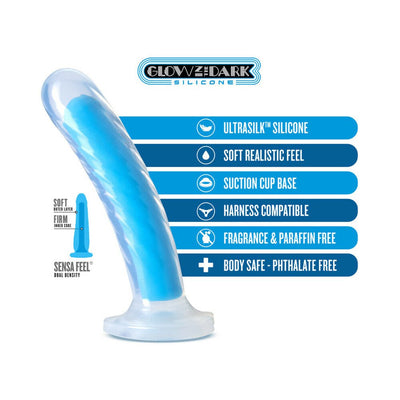 Neo Elite 7-inch neon blue glow-in-the-dark silicone dildo with dual-density design and suction cup base.