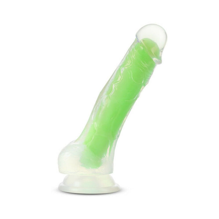 Neon green 7.5-inch dual density silicone dildo with clear outer layer and suction cup base.