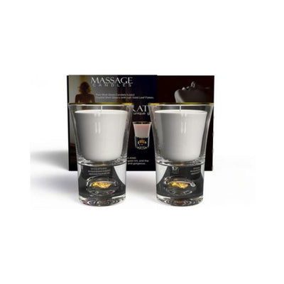 Set of two white massage candles in clear glass holders with gold rim and gold leaf detail, displayed with packaging box.