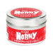 Silver tin container with red label reading "Sooo Horny Pheromone Candle" 4 oz massage candle.