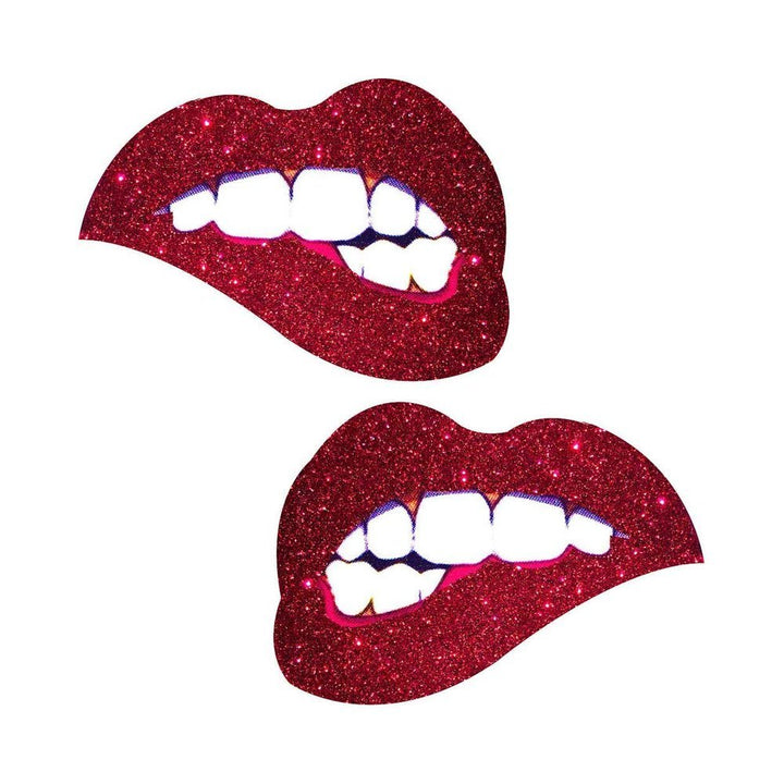 Pair of red glitter lip-shaped nipple covers with a biting lip design on a white background.