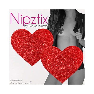 Red glitter heart-shaped nipple covers by Neva Nude shown on a model wearing a black jacket.