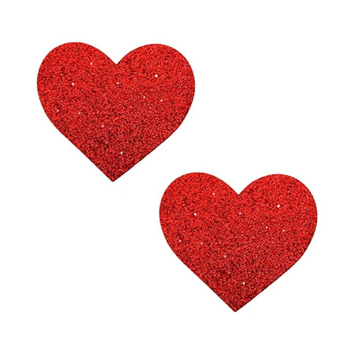 Pair of red glitter heart-shaped nipple covers on a white background for discreet, comfortable wear.
