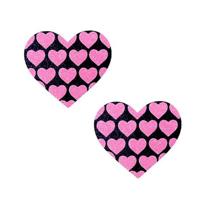 Pair of heart-shaped pasties with pink heart patterns on a black background, designed for stylish coverage.