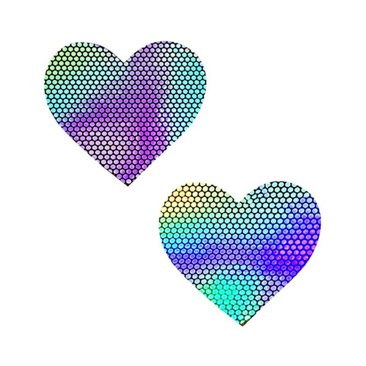 Set of two holographic heart-shaped nipple covers with a shiny, iridescent dot pattern on a white background.