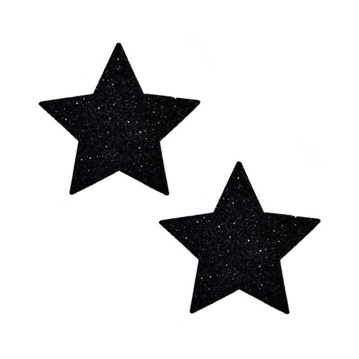Pair of black glitter star-shaped nipple covers on a white background.