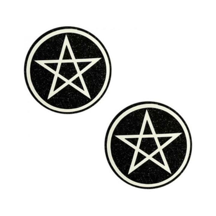 Pair of black glitter pasties with white pentagram design and circular border