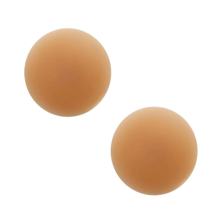 Pair of round mocha-colored reusable silicone nipple covers with a matte finish on white background.
