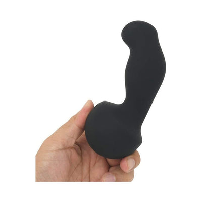 Hand holding a black silicone Nexus Gyro Vibe with a curved, ergonomic shape and rounded base.