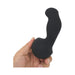 Hand holding a black silicone Nexus Gyro Vibe with a curved, ergonomic shape and rounded base.