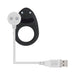 Black silicone vibrating cock ring with USB charging cable on white background.