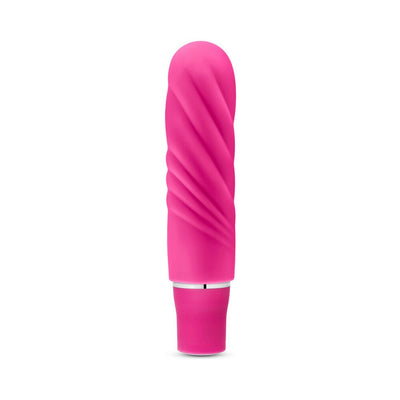 Compact pink silicone mini stimulator with textured spiral design and smooth satin finish.
