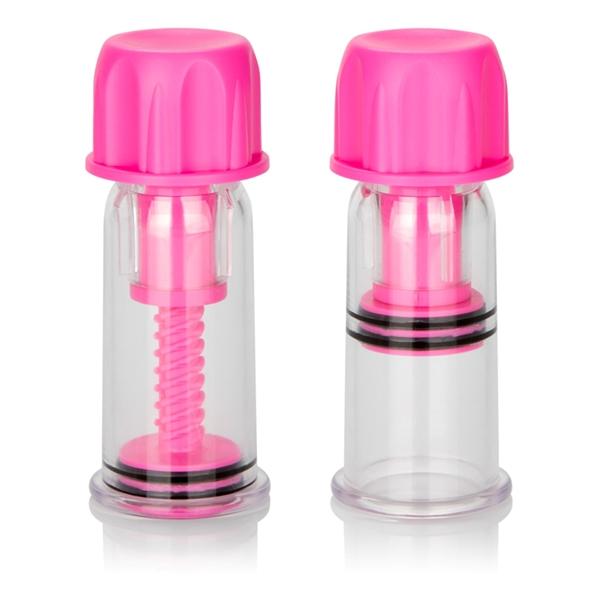 Pair of clear nipple vacuum suckers with bright pink twist caps and adjustable pressure mechanisms.