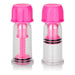 Pair of clear nipple vacuum suckers with bright pink twist caps and adjustable pressure mechanisms.