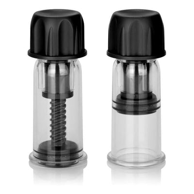 Pair of clear vacuum twist suckers with black caps and adjustable suction mechanism for nipple play.