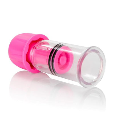 Clear and pink adjustable nipple vacuum sucker with twist cap for customizable suction and easy cleaning.