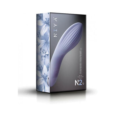 Niya 2 Couples Massager in cornflower blue with textured ergonomic design displayed on floral-themed packaging.