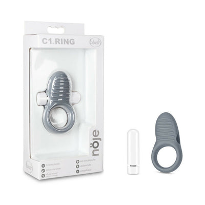 Blush Noje C1 Ring in slate gray with textured silicone and removable white bullet vibrator next to its packaging box.