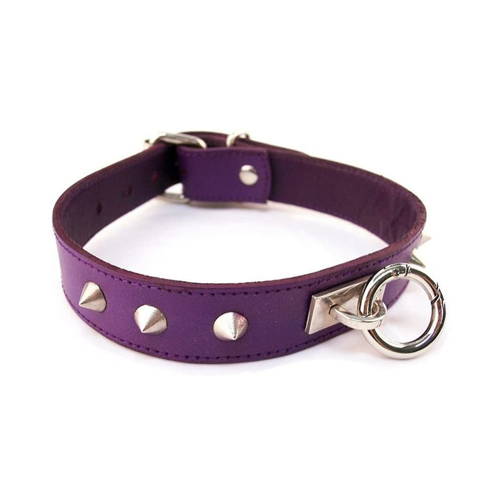 Purple leather collar with silver riveted studs and a removable silver O-ring detail on a white background.