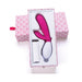 Pink and white dual stimulation vibrator in decorative pink patterned box with USB charger included.