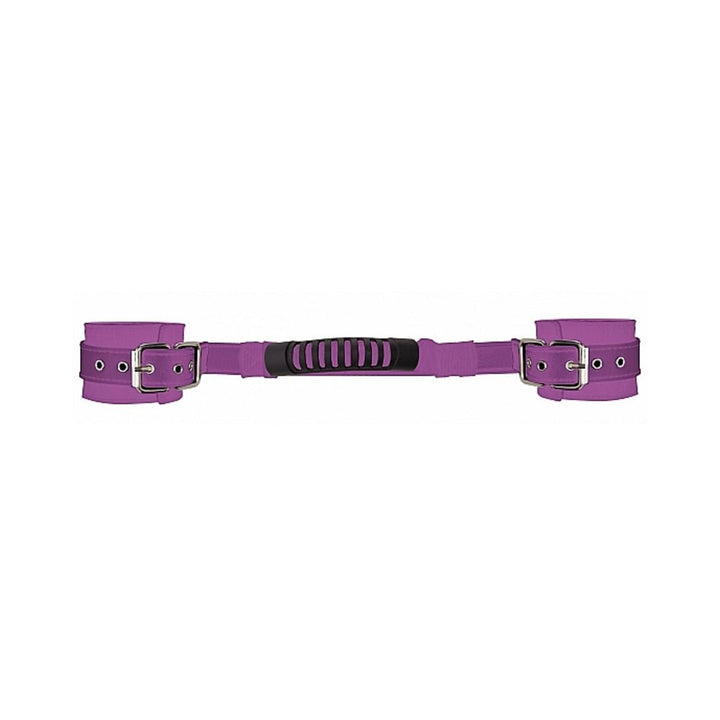 Purple adjustable leather handcuffs with metal buckles and a black grip handle connecting the cuffs.