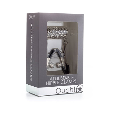 Ouch! Adjustable nipple clamps in stainless steel with a connecting chain, displayed in gray and white packaging.
