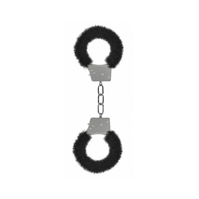 Metal handcuffs lined with soft black faux fur connected by a short chain for comfortable beginner restraint.