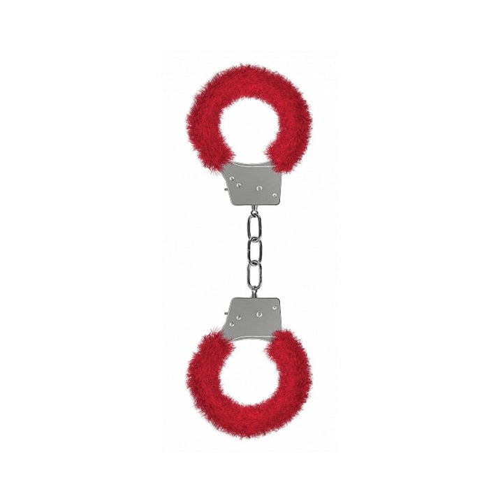Metal handcuffs lined with soft red faux fur for comfortable beginner restraint play.