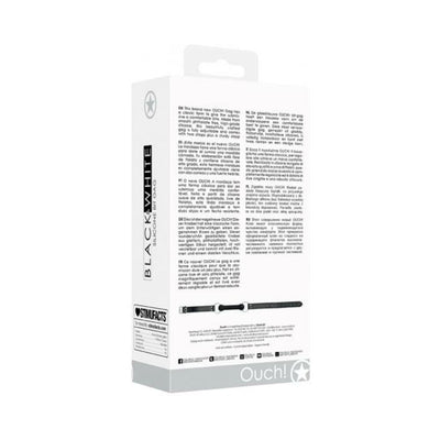 Packaging box of Ouch! Black & White silicone bit gag with adjustable bonded leather straps shown from the back.