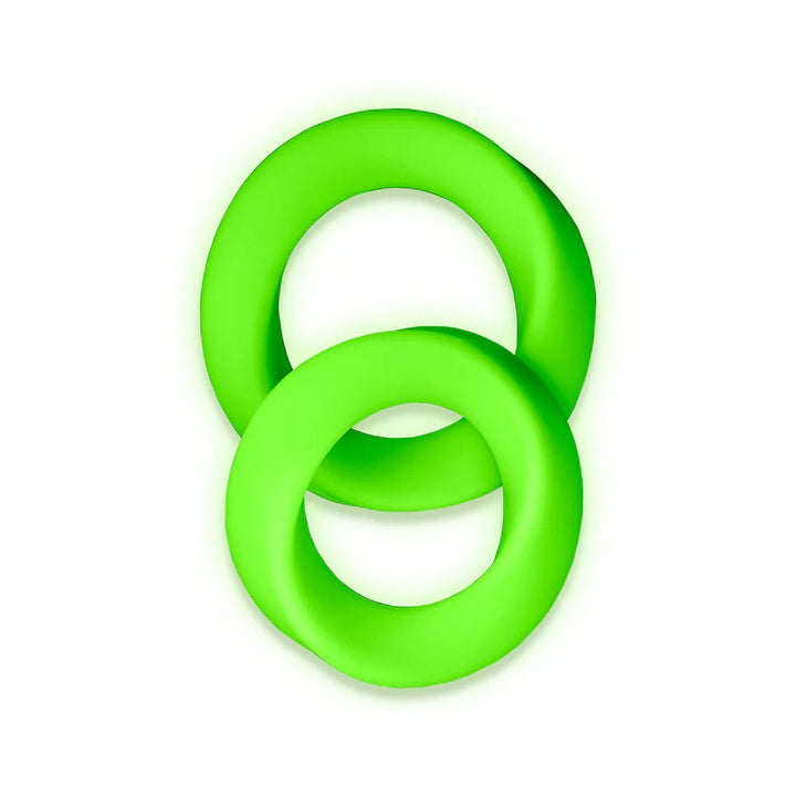 Two green glow-in-the-dark silicone cock rings in different sizes on a white background.