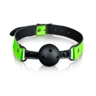 Adjustable breathable ball gag with black ball and neon green glow-in-the-dark PU leather strap.