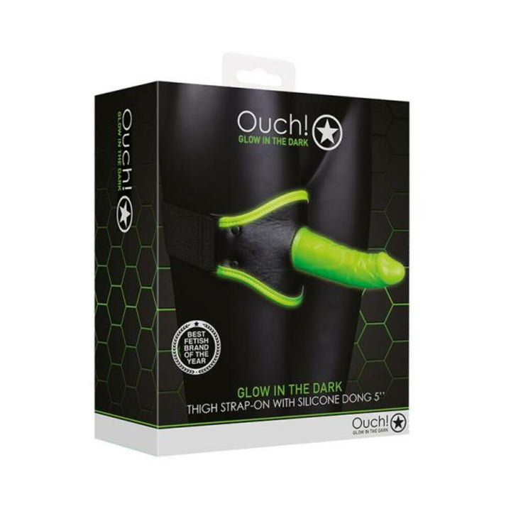 Packaging of Ouch! Glow in the Dark green thigh strap-on with silicone dildo and adjustable black harness.