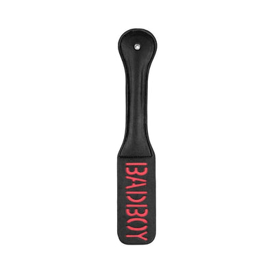 Black leather paddle with red "BAD BOY" text, featuring a stitched handle and a hanging hole at the top.