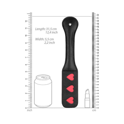 Black leather paddle with three red heart cutouts, measuring 31.5 cm long and 5.5 cm wide, shown with size references.