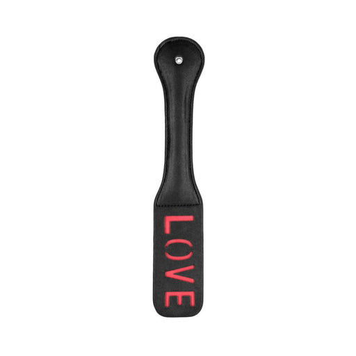 Black leather paddle with stitched edges and reversed red LOVE imprint on the striking surface, featuring a rounded handle.