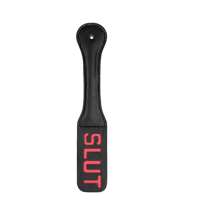 Black leather paddle with red stitched "SLUT" text designed for impact play.