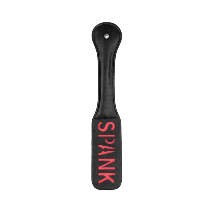 Black leather paddle with red stitched "SPANK" lettering and a rounded handle with a hanging hole.