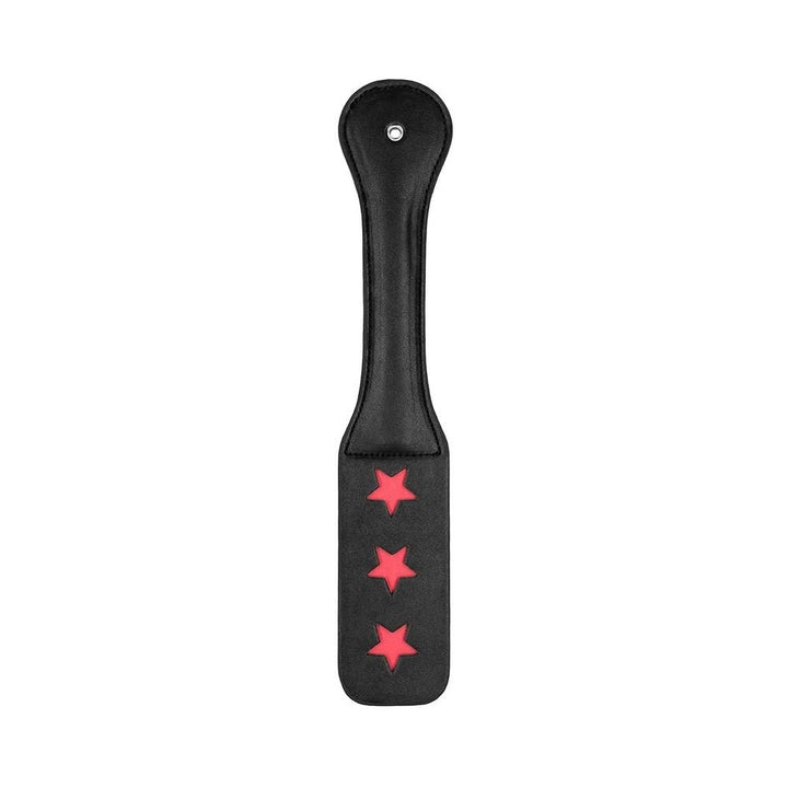Black leather paddle with three red star cutouts and stitched edges, designed for playful impact.