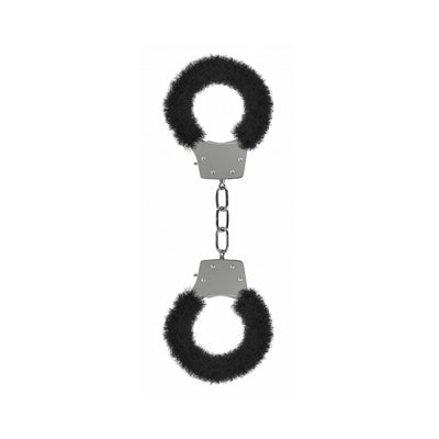 Metal handcuffs with soft black faux fur lining and a short connecting chain for comfortable restraint play.