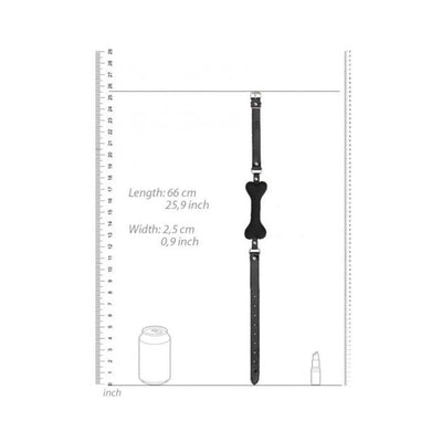 Black silicone bone gag with adjustable bonded leather straps shown with measurement scale for size reference.