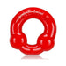 Red flexible cockring with dual nodules and embossed Oxballs logo on a white background.