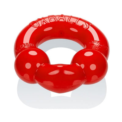Red flexible cockring with dual nodules designed for comfort and performance enhancement.