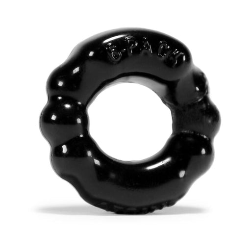 Black flexible textured cockring with embossed "6 PACK" text on a white background.