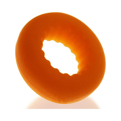 Orange silicone cockring with inner ribbed texture and matte finish for enhanced grip and comfort.