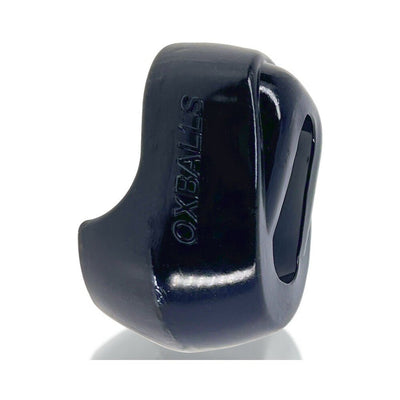 Black oval-shaped Oxballs Big-d Shaft Grip cockring with glossy finish and embossed logo on side.
