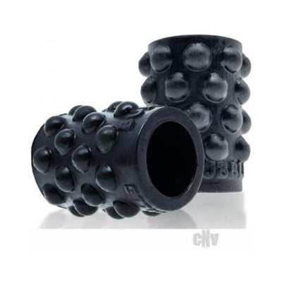 Black silicone nipsuckers with raised bubble texture for enhanced grip and suction, designed for nipple stimulation.