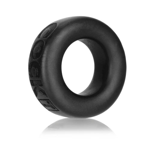 Black soft silicone cock ring with embossed branding, designed for comfort and stretch, shown on white background.
