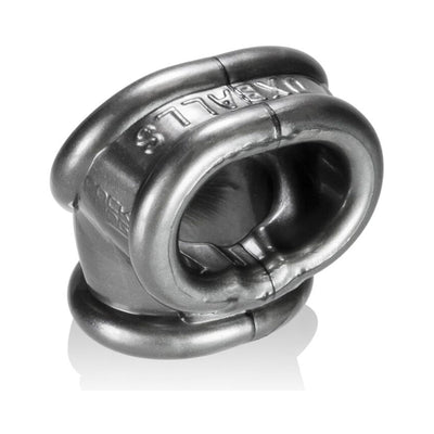 Close-up of a black flexible cockring with ergonomic design and embossed branding on a white background.