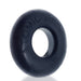 Black silicone cockring with embossed Atomic-Jock logo, smooth matte finish, donut shape.
