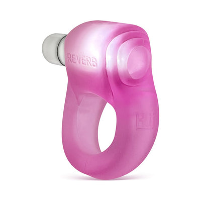Pink translucent silicone cock ring with integrated LED light and textured design for stimulation and secure fit.